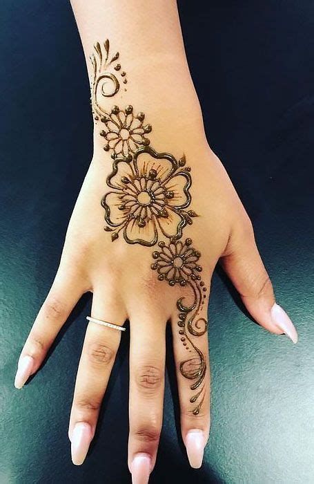 18 Beautiful Henna Tattoo Designs To Try The Trend SpotterHenna Hands