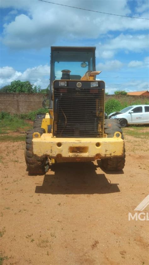 Mamonas Mg P Carregadeira New Holland Modelo C Turbo Ano P