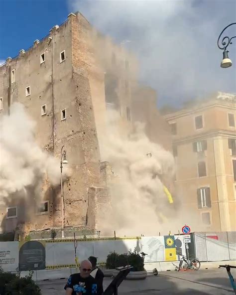 famous rome tower partially collapses  people  video captures