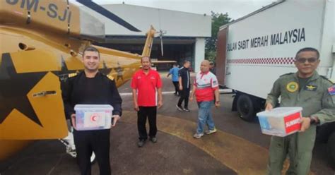 Tunku Idris Terbangkan Helikopter Hantar Bantuan Mangsa Banjir Berita