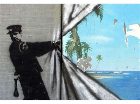 Graffiti by banksy on the west bank wall