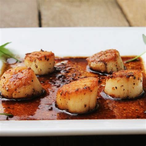 Seared Hokkaido Scallops In Herbs Brown Butter Served With Balsamic