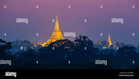 Panorama Of The Shwedagon Pagoda Illuminated At Night In Yangon Burma