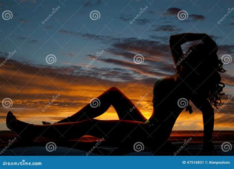 Silhouette Woman Fringe Bikini Sit Back Hand On Head Stock Image