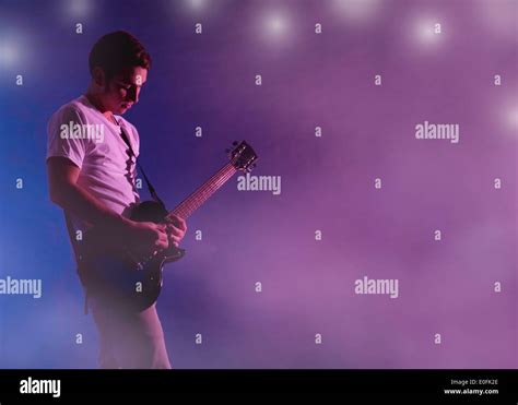 Man playing electric guitar Stock Photo - Alamy