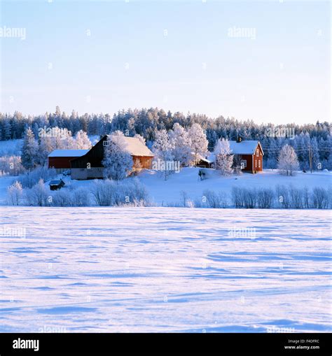 A farm in winter landscape Stock Photo - Alamy