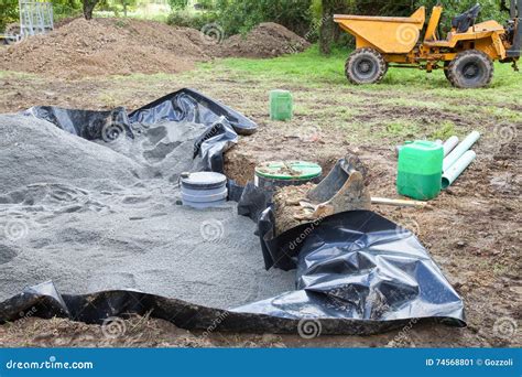 Installing The Sand Filter On A Septic Tank Showing The Liner Stock