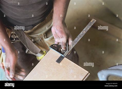 Carpenter Measuring Wood Stock Photo Alamy