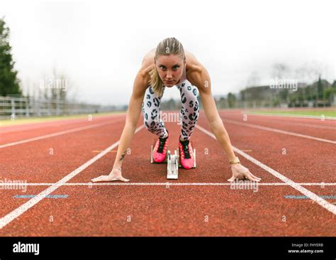 Athlete Woman On A Running Track Stock Photo Alamy