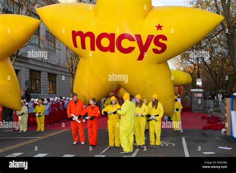 Balloon Handlers Await The Start Of The Macys Thanksgiving Day Parade