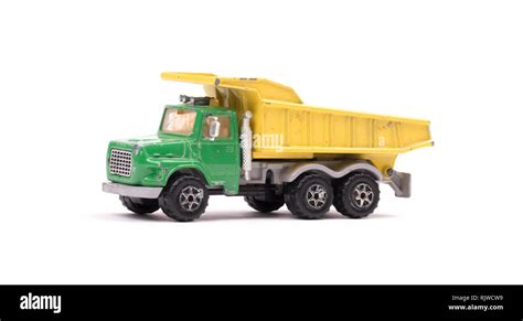 Dump truck toy isolated on white background Stock Photo - Alamy