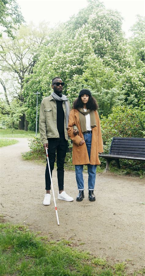 blind man standing   young woman  stock video