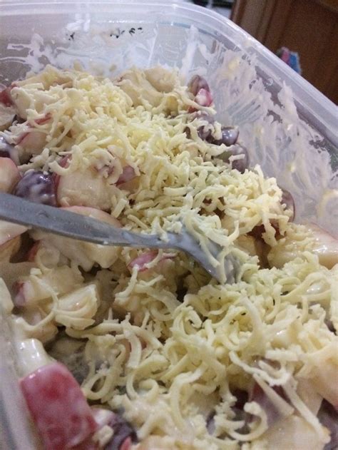 A Plastic Container Filled With Pasta And Meat