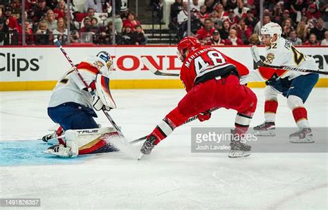 Sergei Bobrovsky of the Florida Panthers saves an attempt by Jordan ...