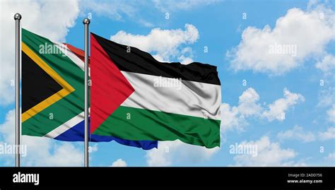 South Africa and Palestine flag waving in the wind against white cloudy ...