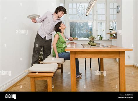 man serving  partner  meal stock photo alamy