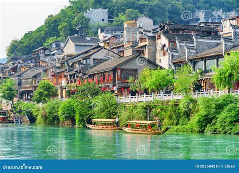 View Of Traditional Wooden Tourist Boats On The Tuojiang River