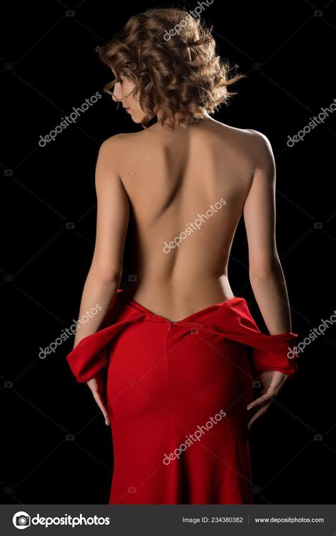 Slim Nude Woman Cropped Rearview In The Dark Stock Photo By Wisky