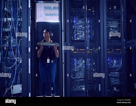 Female Technician Working In Server Room Stock Photo Alamy