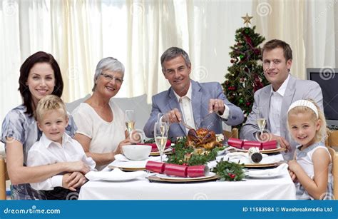 Family Eating Turkey In Christmas Eve Dinner Stock Photo - Image: 11583984