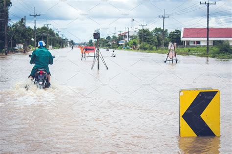 Road closed because of flooding featuring flood, road, and sign ...