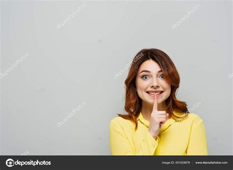 Smiling Woman Curly Hair Showing Hush Gesture Isolated Grey Stock