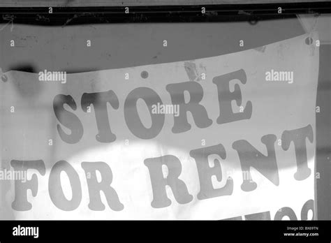 Red And White Store For Rent Sign Behind Glass Window Stock Photo Alamy