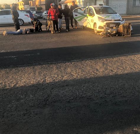 Choque Entre Motociclista Y Taxi