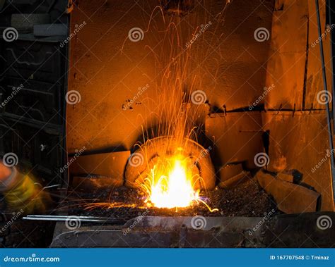 blacksmith forging iron  workshop stock photo image  material