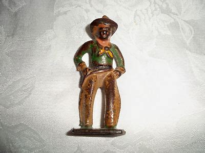 Old Vintage Cast Iron Cowboy Toy Hand Painted Antique Price Guide