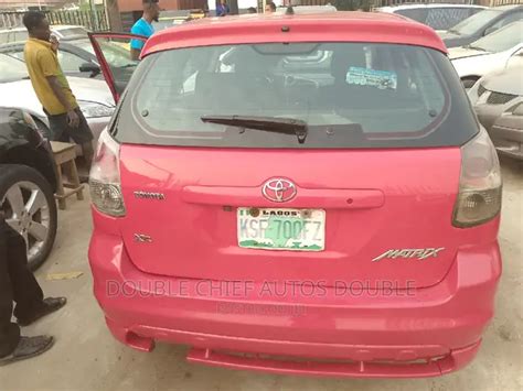 Nigerian Used Toyota Matrix 2005 Red Hatchback In Isolo Lagos 1PAGNK