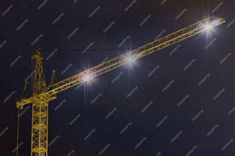 Premium Photo | Construction crane at night