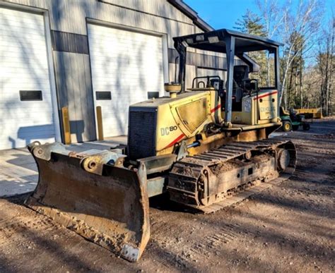 Watch The Video New Holland DC 80 Bulldozer Has A 9 Foot Blade With