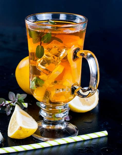 Premium Photo Cold Tea With Lemon Mint And Ice