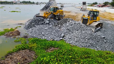 Start Action With Dozer Shantui And Wheel Loader Move Stone And Sand In