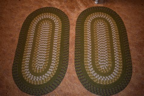 Lot - Pair of Oval Braided Rugs