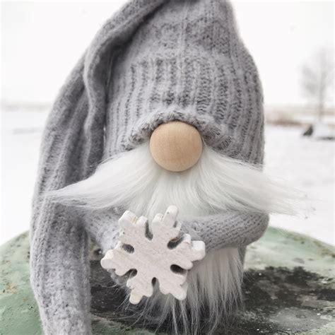 Adorable Winter Gnome Holding A Snowflake Christmas And Winter Gnomes