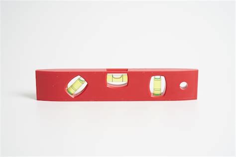 Premium Photo Red Spirit Level On A White Background