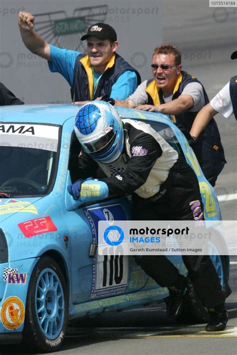 Christian Benz Ger Pushes His Renault Clio Across The Line To Finish