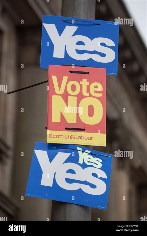 Vote No And Yes Scotland Signs On A Lamppost During The Scottish