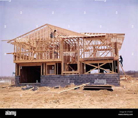 1970s CONCRETE CINDER BLOCK AND WOOD FRAME HOUSE UNDER CONSTRUCTION Stock Photo - Alamy