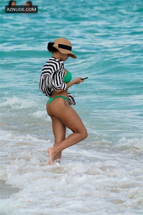 Jordan Ozuna Sexy Strutting Around The Beach In A Green Thong Bikini In