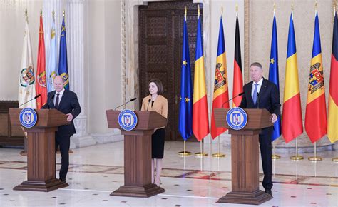 Klaus Iohannis și Olaf Scholz după reuniunea trilaterală cu Maia Sandu