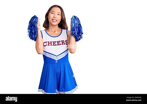 Young Beautiful Chinese Girl Wearing Cheerleader Uniform Holding Pompom