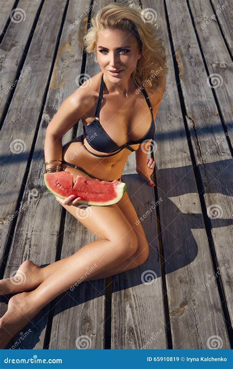 Woman Blond Watermelon Sun Tan Beatch Swimsuit Swimwear Stock Image