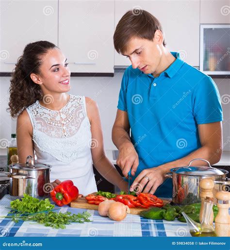 Young Husband Helping Wife Stock Photo Image Of Caucasian 59834058