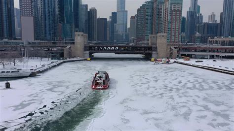 Downtown Chicago Covered In Snow And Ice Amid Historic Cold Snap Afp