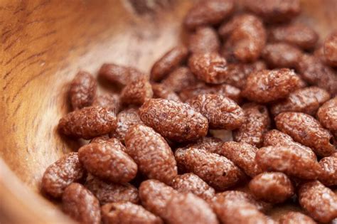 Chocolate Cereal Puffed Rice Flakes In Wooden Rustic Bowl Stock Photo