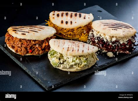 Venezuelan Latin American Food 4 Arepas Of Different Stuffing On A