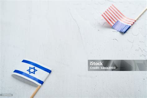 Israel Usa Flags Two American And Israeli Flags Lie On White Old ...